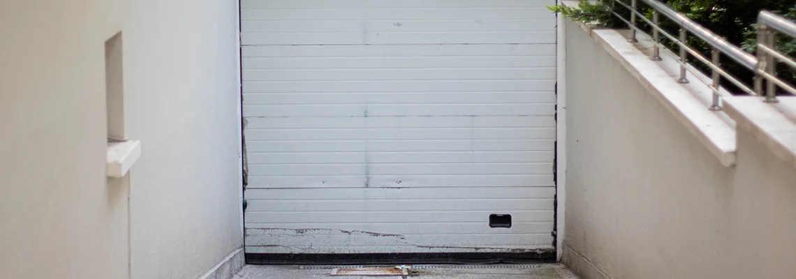 Overhead Bent Garage Door Repair in Guelph, Ontario