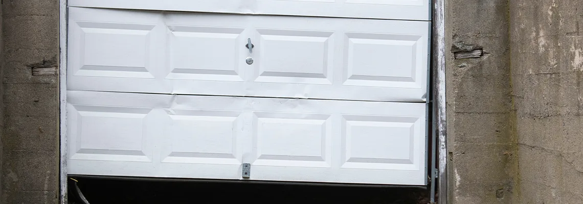 Garage Door Got Hit By A Car Dent Removal in Guelph, ON