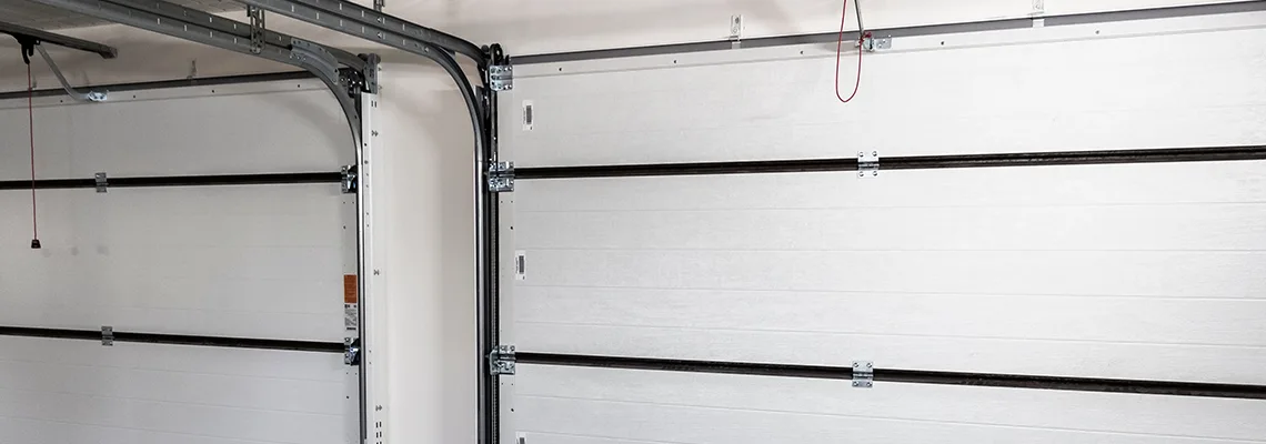Fix Folding Garage Door Jerking in Guelph, Ontario