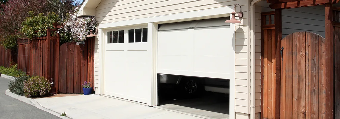 Fix Metal Garage Door Jerking in Guelph, Ontario